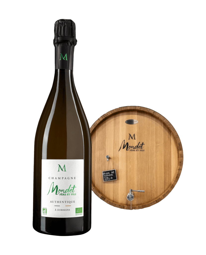 Imagen de la champagne Origine de Mondet Père et Fils donde se destaca la etiqueta de color verde