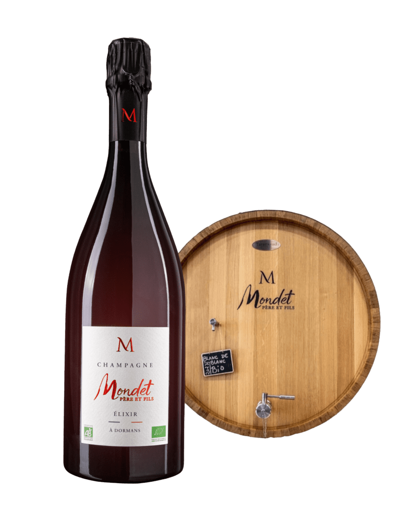 Imagen de la champagne Origine de Mondet Père et Fils donde se destaca la etiqueta de color roja