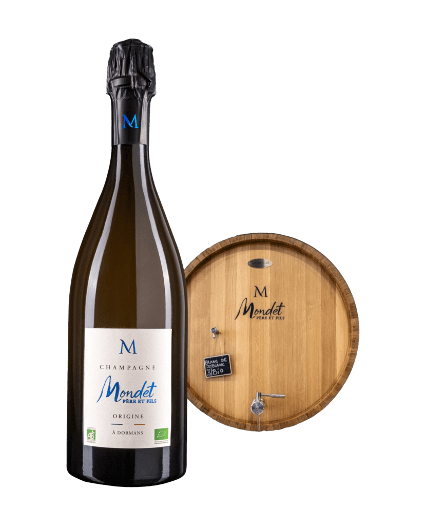 Imagen de la champagne Origine de Mondet Père et Fils donde se destaca la etiqueta de color azul
